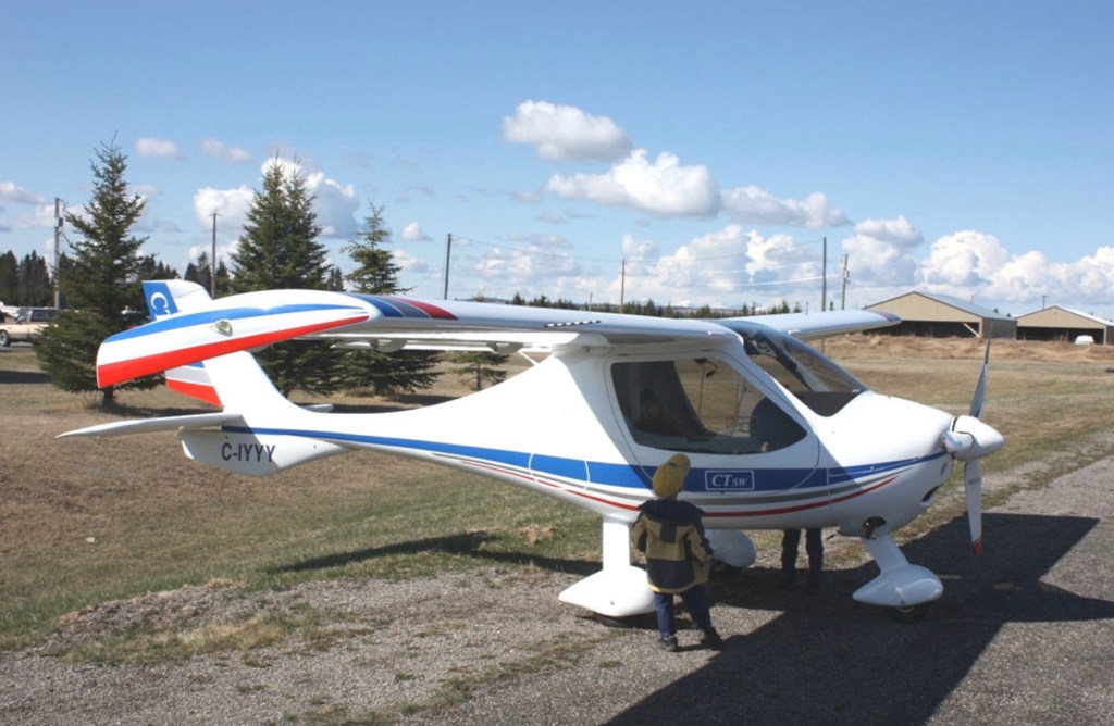 Photo: Boy looking at plane ©CRFCYYC