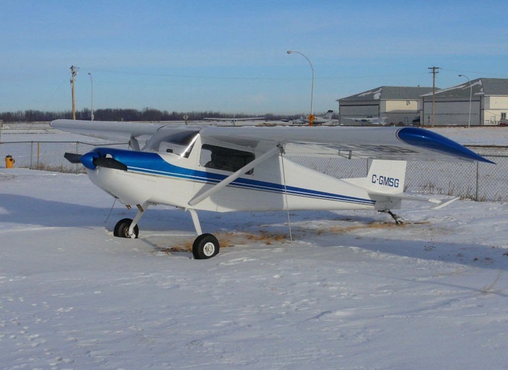 Photo: Parked blue & white airplane Airplane flying ©CRFCYYC